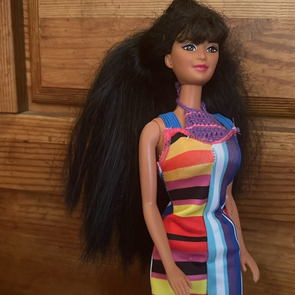 Pearl Beach Kira Barbie Doll with Black Hair two outfits